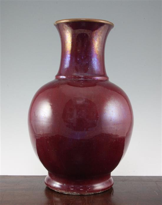 A large Chinese flambe glazed baluster vase, 18th / 19th century, 41cm, later copper mount to the rim